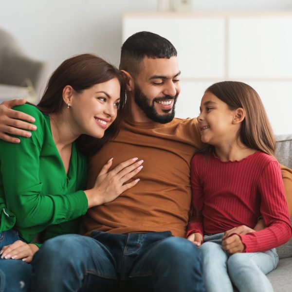 Portrait of cheerful happy family spending time at home